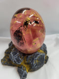 Clear Resin Egg with cute Pink Dragon inside.